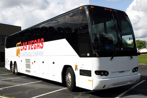 a plain white charter bus with a 