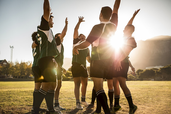 players huddle before a game